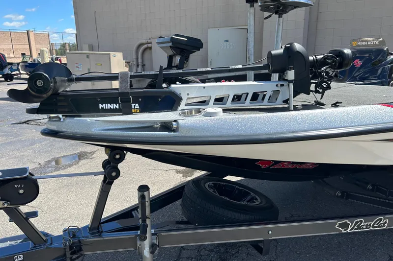 Slide: The Image of 2018 Bass Cat Lynx boat with Minn Kota trolling motor on trailer. - 5