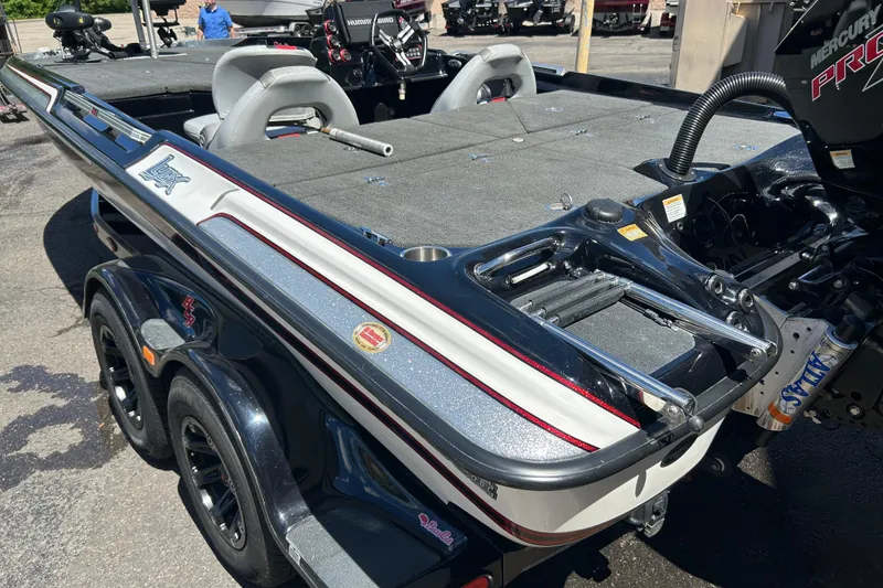 Slide: The Image of 2018 Bass Cat Lynx boat with dual seats and Mercury Pro XS engine. - 6