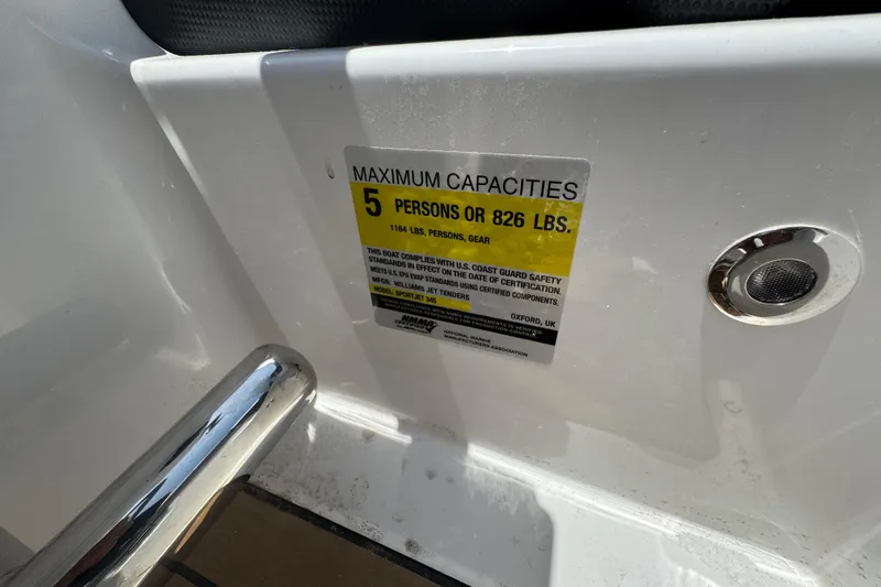 Slide: The Image of 2025 Williams Jet Tenders Sportjet 345 capacity label, maximum 5 persons or 826 lbs. - 10