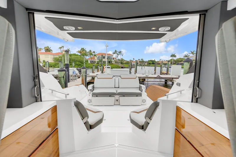 Slide: The Image of Interior view of 2021 Tiara Sport 43 LE yacht at a marina. - 40
