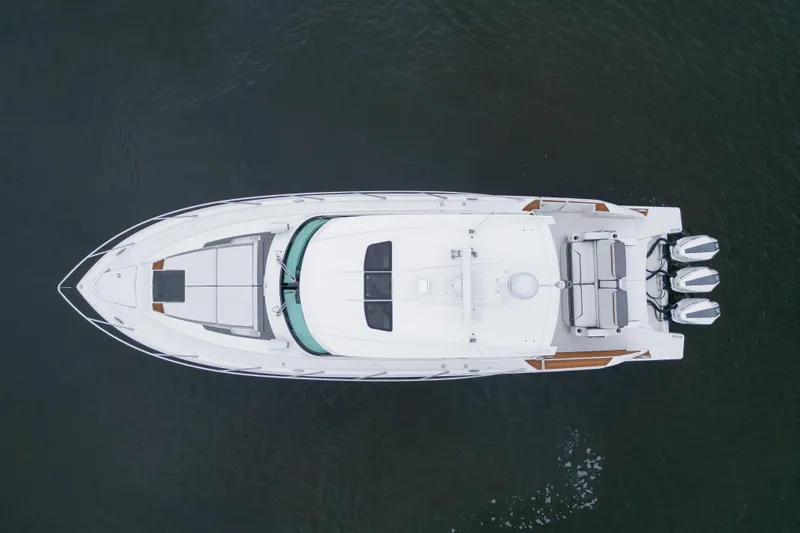 Slide: The Image of Overhead view of 2021 Tiara Sport 43 LE boat on water. - 47