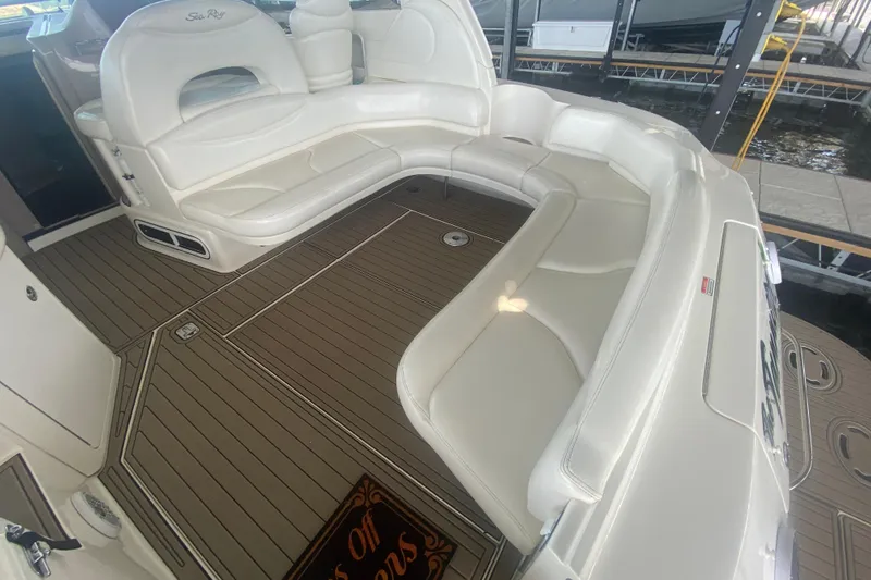 Slide: The Image of Luxurious seating area on a 2004 Sea Ray 380 Sundancer yacht with elegant white upholstery. - 14