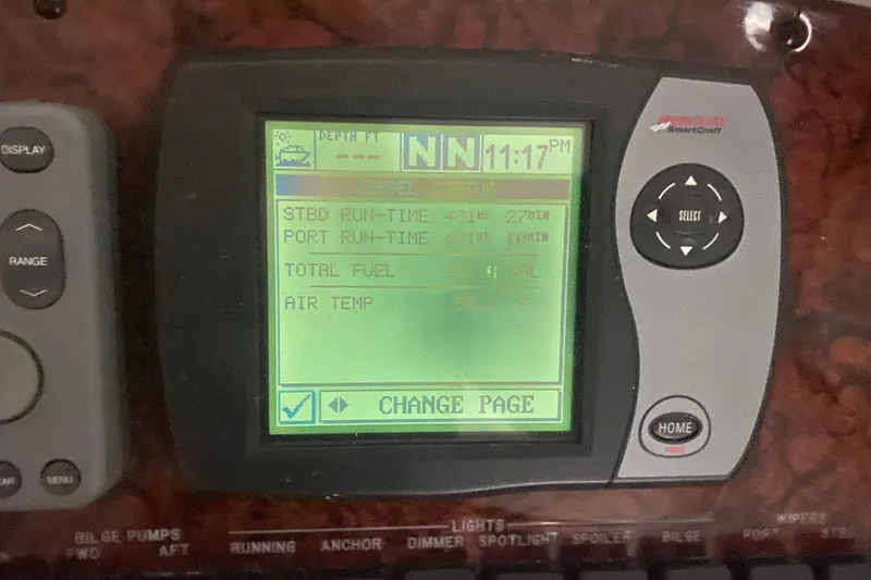 Slide: The Image of Close-up of a 2004 Sea Ray 380 Sundancer boat's control panel display. - 21