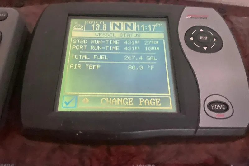 Slide: The Image of Display screen on 2004 Sea Ray 380 Sundancer showing vessel status and fuel data. - 22