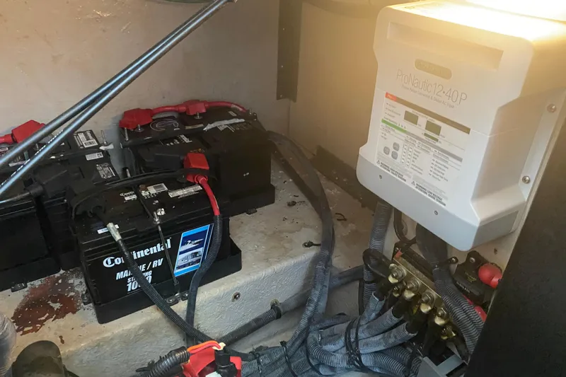Slide: The Image of Electrical system of a 2004 Sea Ray 380 Sundancer with batteries and ProNautic charger. - 34