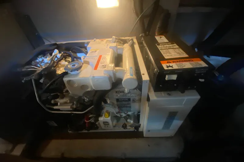 Slide: The Image of Engine compartment of a 2004 Sea Ray 380 Sundancer with Kohler power system. - 36