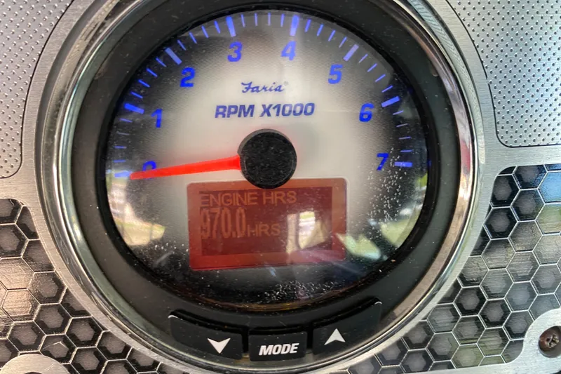 Slide: The Image of Tachometer of 2014 Cruisers 328 Black Diamond showing 970 engine hours. - 26