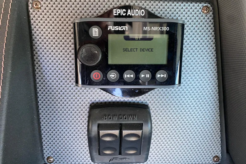 Slide: The Image of Fusion MS-NRX300 audio system on 2014 Cruisers 328 Black Diamond boat dashboard. - 27