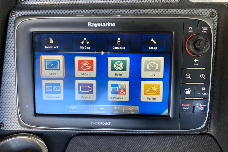 Slide: The Image of Raymarine navigation system on 2014 Cruisers 328 Black Diamond boat dashboard. - 28