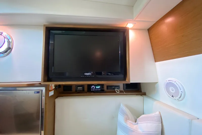 Slide: The Image of Interior of 2014 Cruisers 328 Black Diamond yacht with TV and modern amenities. - 34