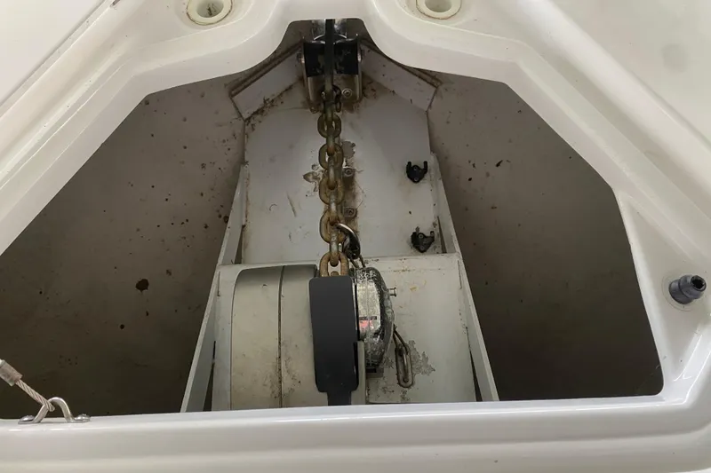 Slide: The Image of Anchor chain compartment of 2014 Cruisers 328 Black Diamond boat. - 44