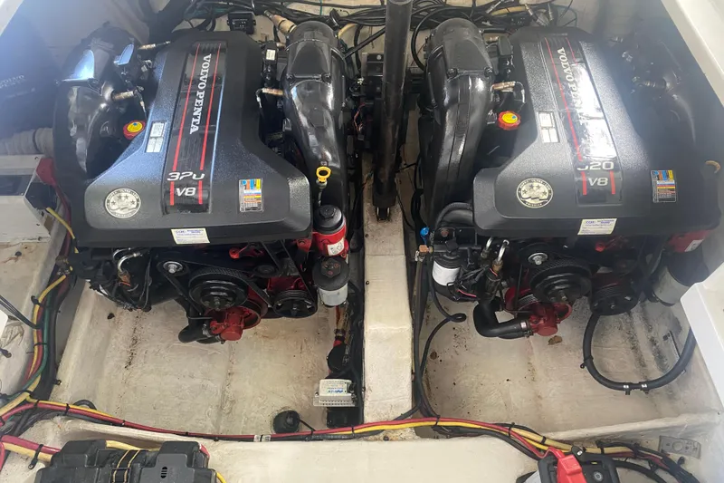 Slide: The Image of Twin Volvo Penta V8 engines in a 2014 Cruisers Sport Series 328 Black Diamond boat. - 53