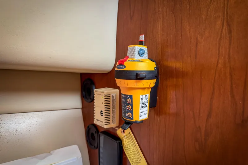 Slide: The Image of Emergency beacon mounted on 2006 Rampage 33 Express boat interior wall. - 14