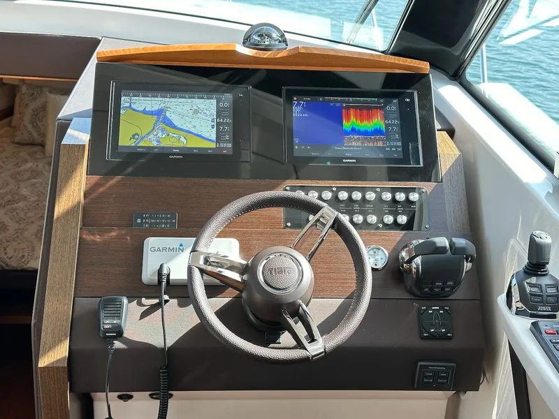 Slide: The Image of Helm of 2019 Tiara Yachts Coupe 39 with Garmin navigation system. - 25