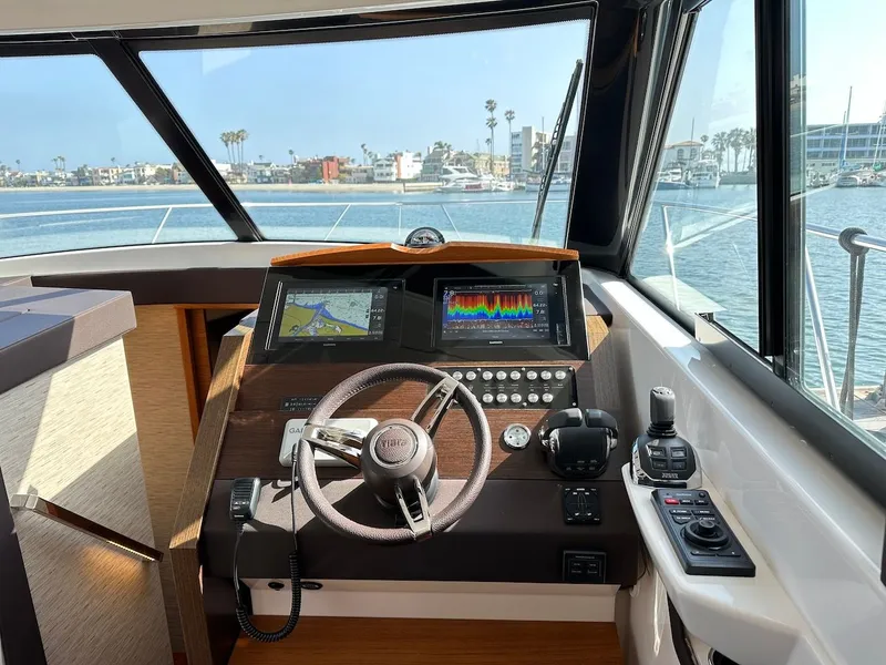 Slide: The Image of Interior view of the helm in a 2019 Tiara Yachts Coupe 39. - 26
