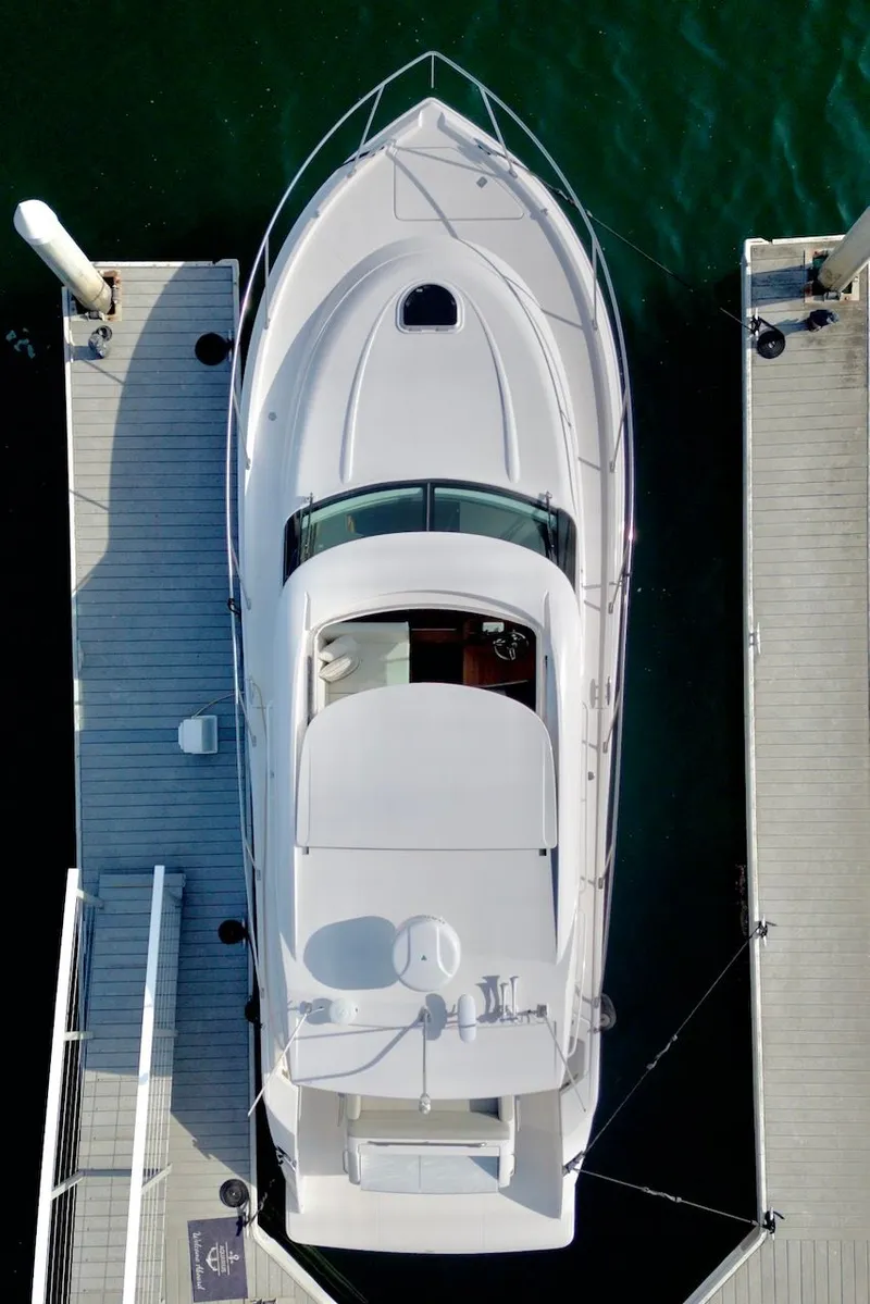 Slide: The Image of Aerial view of a 2019 Tiara Yachts Coupe 39 at the dock. - 3