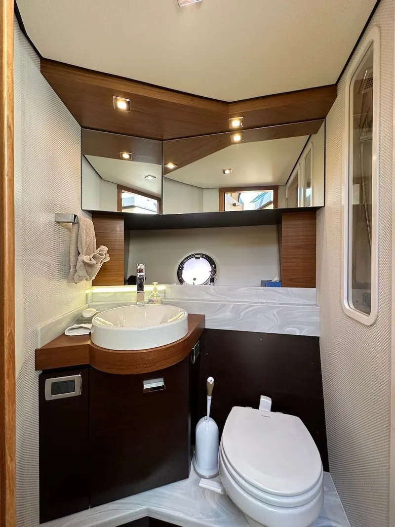 Slide: The Image of Luxurious bathroom in a 2019 Tiara Yachts Coupe 39 yacht. - 36