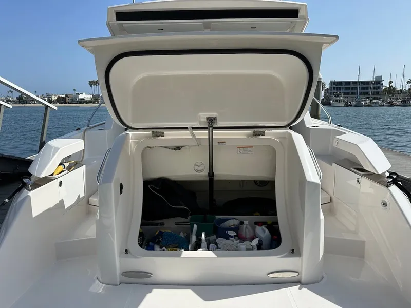Slide: The Image of Open storage compartment on a 2019 Tiara Yachts Coupe 39. - 4