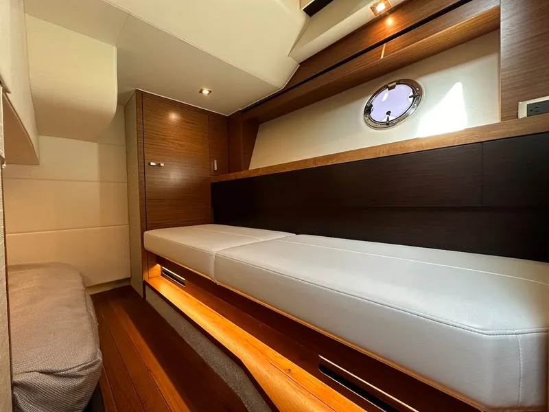 Slide: The Image of Interior of 2019 Tiara Yachts Coupe 39 with elegant wood paneling. - 42