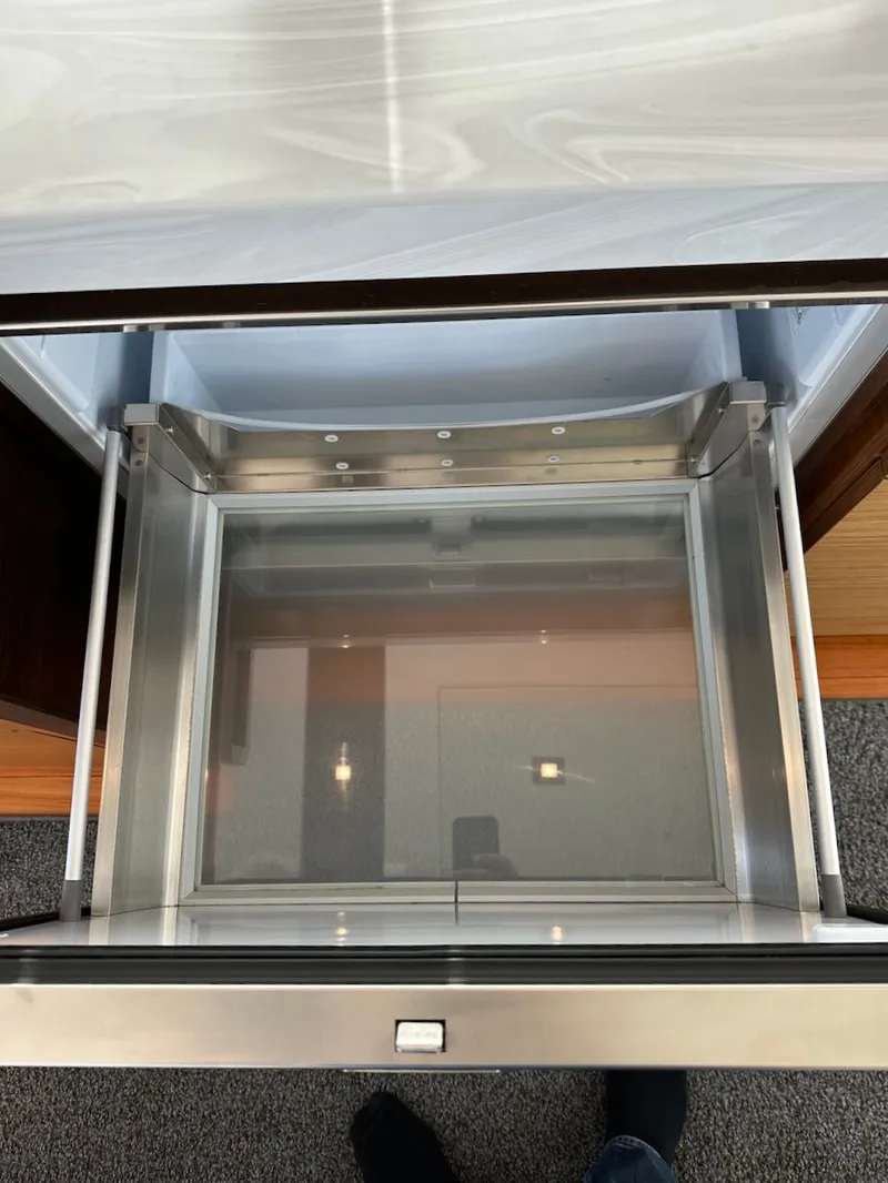 Slide: The Image of Interior view of an empty drawer on the 2019 Tiara Yachts Coupe 39. - 48
