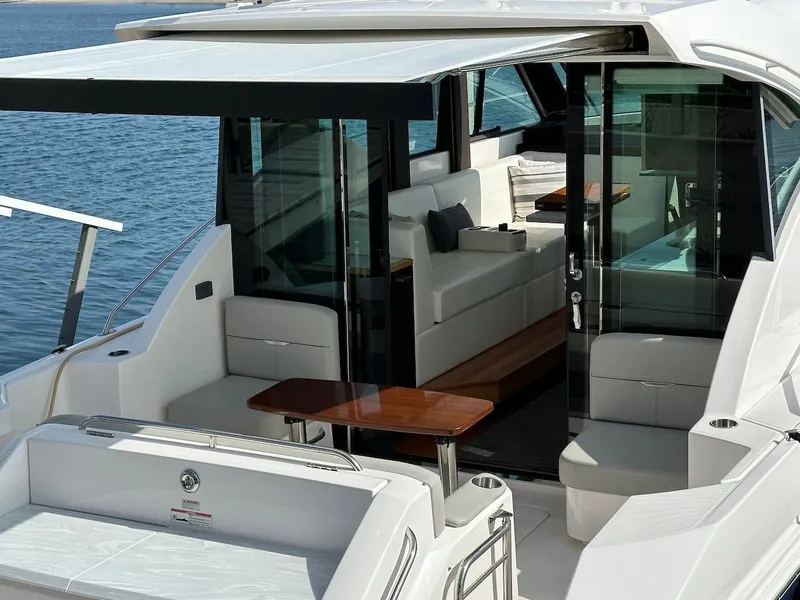 Slide: The Image of 2019 Tiara Yachts Coupe 39 with luxurious interior and ocean view. - 7