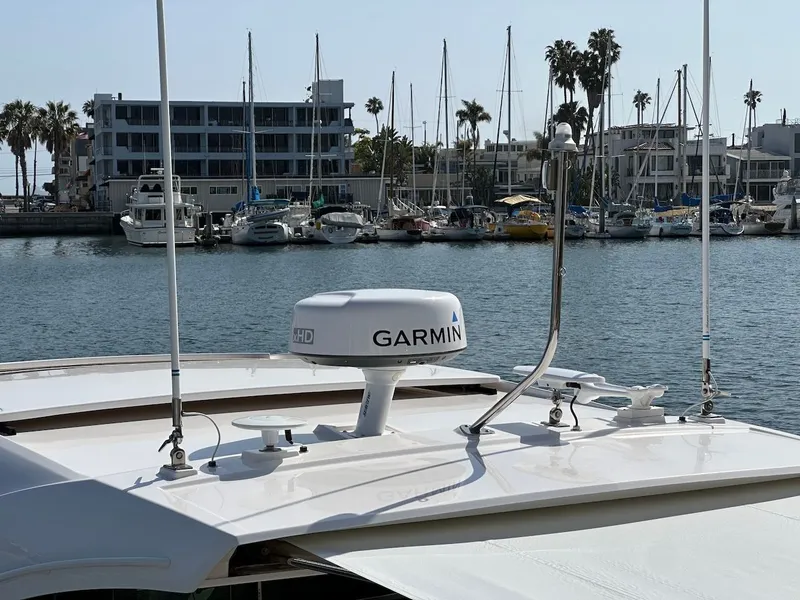 Slide: The Image of 2019 Tiara Yachts Coupe 39 with Garmin equipment in harbor. - 9
