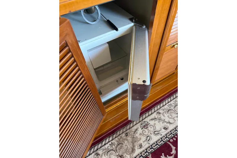 Slide: The Image of Open wooden cabinet with safe inside, PT Sundeck 1987 model. - 23