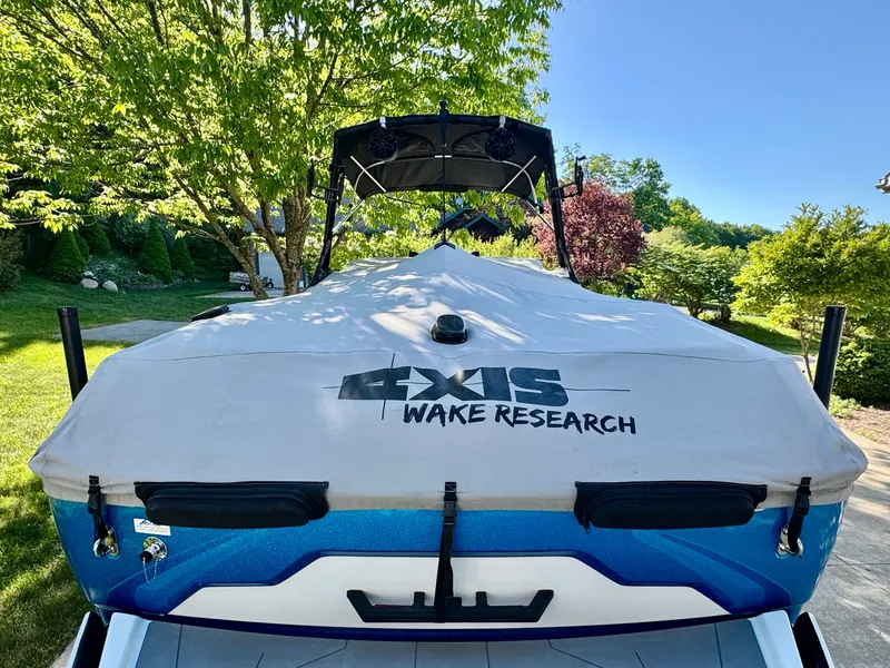 Slide: The Image of 2022 Axis Wake Research A24 boat with cover in garden. - 46