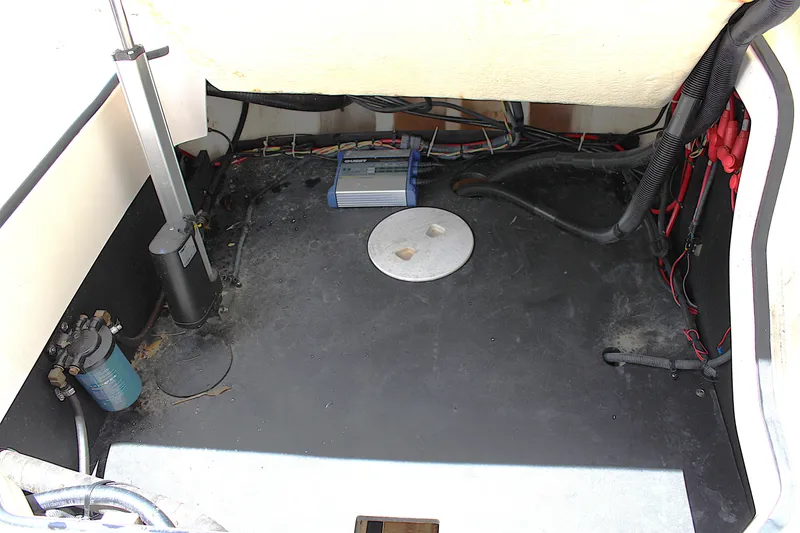 Slide: The Image of 2021 Regal 26 OBX boat engine compartment with wiring and components. - 42