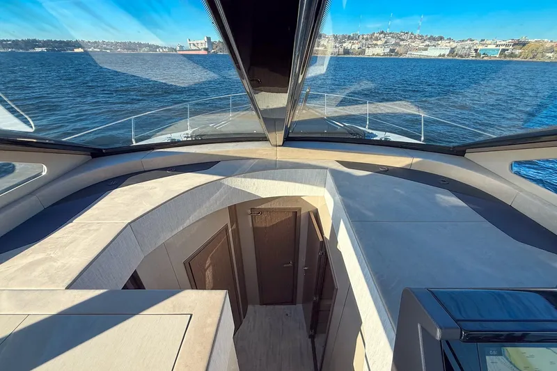 Slide: The Image of Luxurious interior view of 2027 Cruisers Yachts 50 Fly on open water. - 28