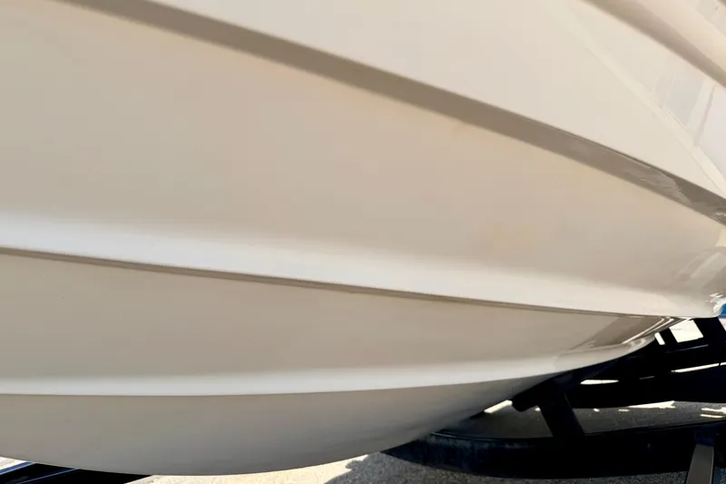 Slide: The Image of Close-up of a 2000 Chaparral 235 SSi boat hull on a trailer. - 11
