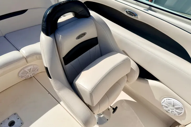 Slide: The Image of Luxury seating on 2000 Chaparral 235 SSi boat, featuring plush upholstery and sleek design. - 42