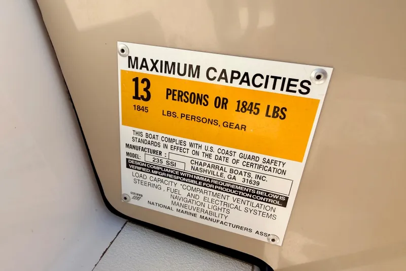 Slide: The Image of Capacity label on 2000 Chaparral 235 SSi boat, max 13 persons or 1845 lbs. - 49