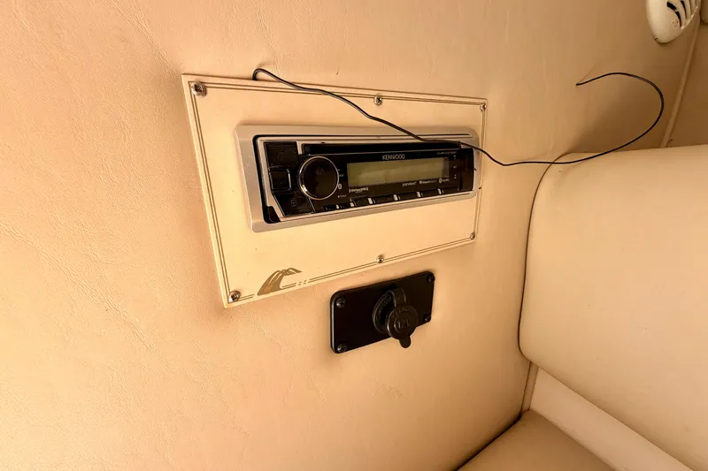Slide: The Image of Kenwood stereo system in 2000 Chaparral 235 SSi boat interior. - 54