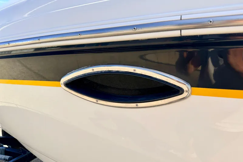 Slide: The Image of Close-up of 2000 Chaparral 235 SSi boat hull with chrome detailing. - 74
