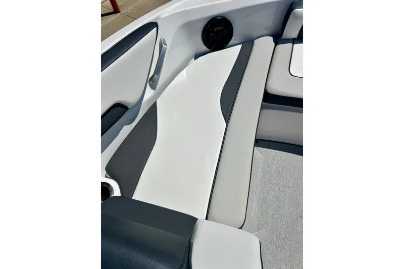 Slide: The Image of 2024 Yamaha Boats SX195 interior seating with sleek, modern design and comfortable upholstery. - 24