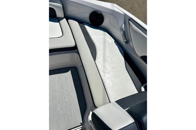 Slide: The Image of 2024 Yamaha Boats SX195 interior seating with sleek design and comfortable upholstery. - 26
