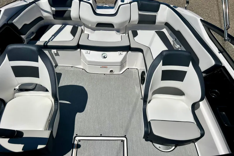 Slide: The Image of 2024 Yamaha Boats SX195 interior with sleek seating and modern design. - 31