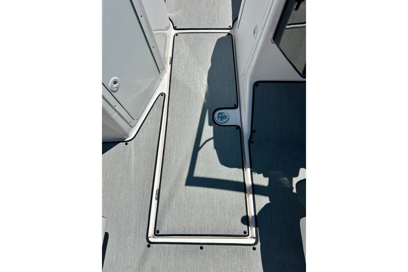Slide: The Image of 2024 Yamaha Boats SX195 interior deck with sleek, modern design and durable flooring. - 41