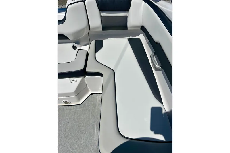 Slide: The Image of 2024 Yamaha Boats SX195 interior seating with sleek, modern design and comfortable upholstery. - 45