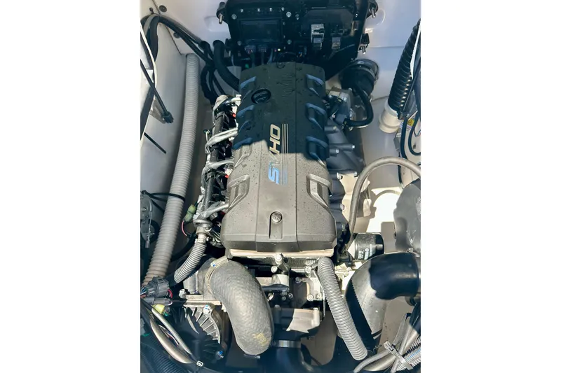 Slide: The Image of Engine compartment of 2024 Yamaha Boats SX195, showcasing advanced marine technology. - 47