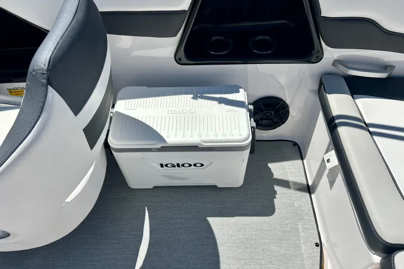 Slide: The Image of 2024 Yamaha Boats SX195 interior with Igloo cooler and seating area. - 48