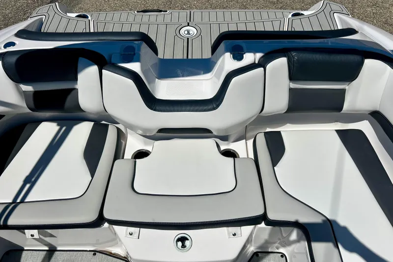 Slide: The Image of 2024 Yamaha Boats SX195 interior seating with sleek design and comfortable upholstery. - 54