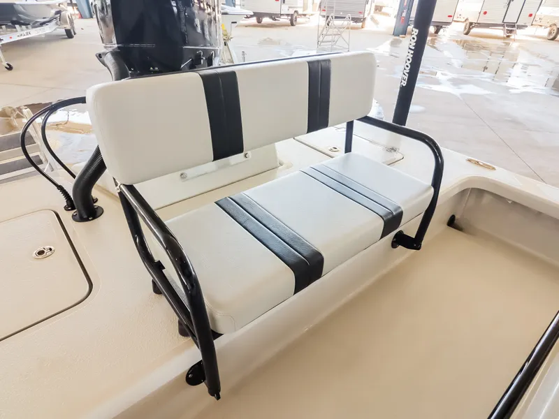 Slide: The Image of Majek M2 Illusion 2026: White seat with black stripes, sturdy design, in a showroom. - 17