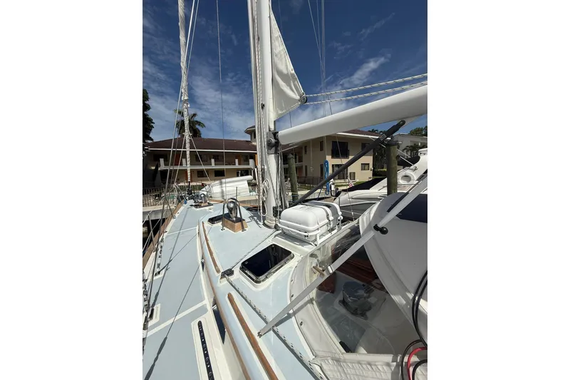 Slide: The Image of 1986 Little Harbor LH46 sailboat deck with rigging and clear sky background. - 35
