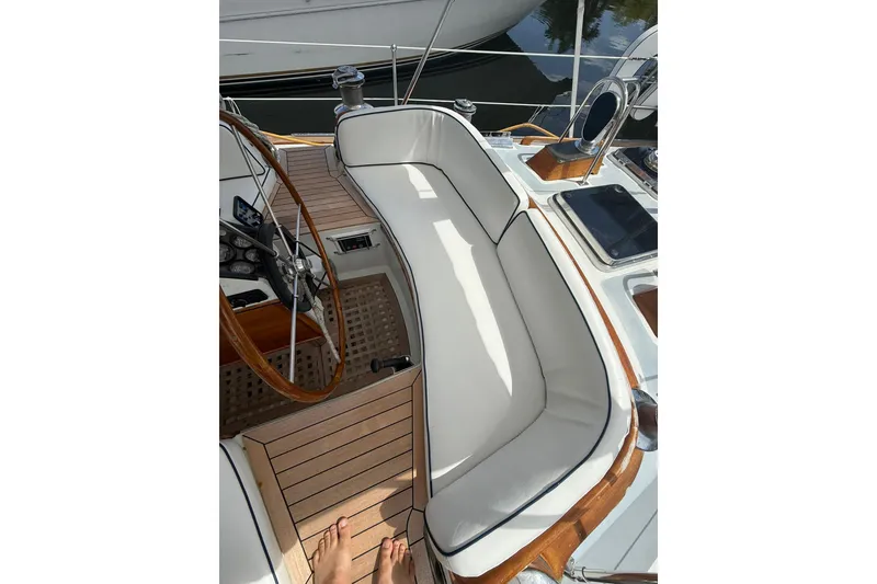 Slide: The Image of Cockpit of 1986 Little Harbor LH46 yacht with wooden accents and white seating. - 37
