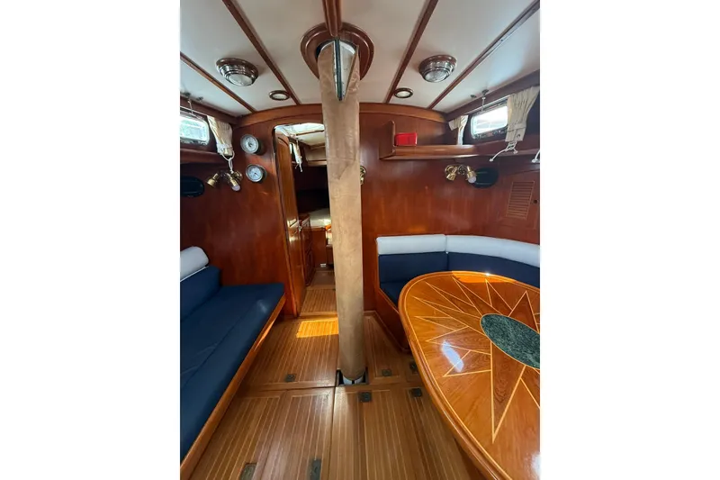 Slide: The Image of Interior of 1986 Little Harbor LH46 yacht with elegant wood finish and seating area. - 45