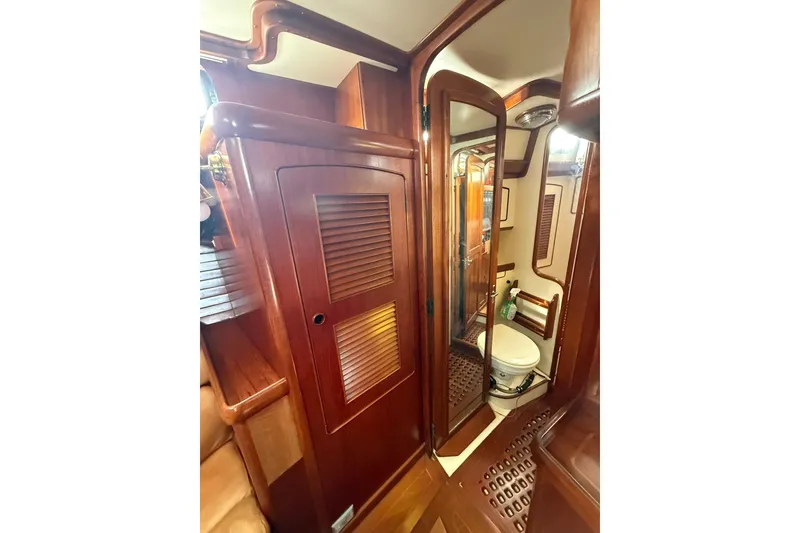 Slide: The Image of Luxurious wooden interior of 1986 Little Harbor LH46 yacht bathroom. - 56