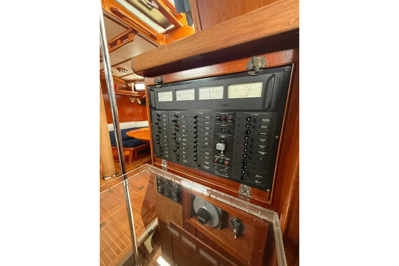 Slide: The Image of Electrical panel inside 1986 Little Harbor LH46 yacht, featuring gauges and switches. - 61