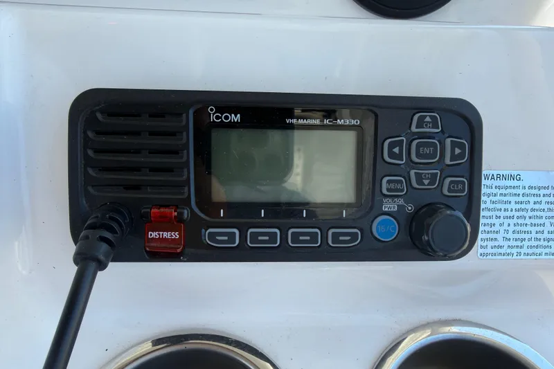 Slide: The Image of ICOM VHF Marine IC-M330 radio on 2024 Solara S-250 CW boat dashboard. - 18